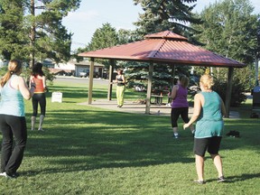 Krista Zaft (centre) teaches a free Zumba class in Centennial Park on Wednesday, July 25. The outdoor classes have been raising cash for the Devon Christmas Elves and food for the Leduc and District Food Bank.
