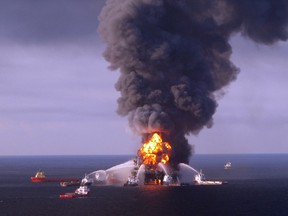 This U.S. Coast Guard image released on April 22, 2010 shows fire boat response crews as they battle the blazing remnants of the off shore oil rig Deepwater Horizon April 21, 2010.