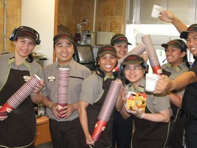 Staff at Peace RIver Tim Hortons were in high spirits Friday afternoon, surprising customers with free coffee after a mysterious benefactor purchased 500.