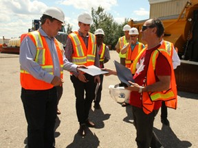 Brian Kelly, spokesman for the Ontario Northland General Chairperson's Association, delivers a release Friday to Infrastructure and Transportion Minister Glen Murray calling for talks with the province regarding the future of the ONTC.