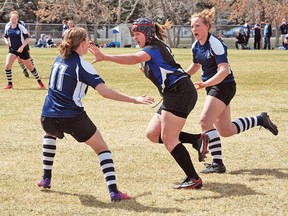 DaLeaka Menin, 18, pictured here at a local rugby game in a Vulcan Advocate file photo, returned earlier this week from England. She was part of the Team Canada U20 rugby squad, which went on to win - for the first time - the Nations Cup.