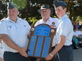 Cadet William Murray, 14, of Georgetown, receives the Lt. Col. James Gale Air Cadet League of Canada Award, awarded for the cadet who has excelled in the study of fundamentals of aerospace, airport operations, aircraft manufacturing and aircraft maintenance. Presenting the award are Capt. Matthew Dierickse and Lt. Col. James Gale (ret'd).