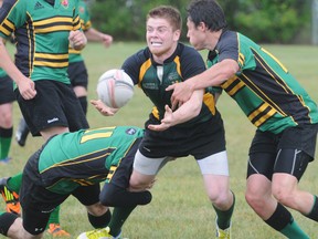 GP Centaurs Brennan McIntosh pays a painful price delivering a pass to his teammates during their ERU match Saturday at Macklin Field against the Edmonton Lep-Tigers. The Centuars won the contest 43-10.
Fred Rinne/ Herald-Tribune staff