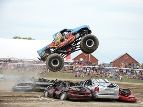 RYAN PAULSEN ryan.paulsen@sunmedia.ca
Driver Paul Breaud sends Instigator flying high into the air during the second of three monster truck demonstrations on Saturday afternoon and evening at this year's Beachburg Fair. Nearly 6,000 people streamed through the gates on Saturday alone, largely thanks to the attraction of several screaming monster trucks defying gravity to the delight of the crowds. For more community photos please visit our website photo gallery at www.thedailyobserver.ca.