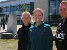 Kingston Police officers Carla Borel, left, Krista Loye and Chris MacDonald, along with a colleague, will be competing in the World Police and Fire Games in Belfast, Ireland, in August. The team has been sponsored by the community to compete at the international competition. (Danielle VandenBrink The Whig-Standard)