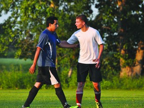 United's Brendon Wieler tells an opponent to relax during the Portage United/Tri-S Strike Force game on July 28. (Kevin Hirschfield/THE GRAPHIC/QMI AGENCY