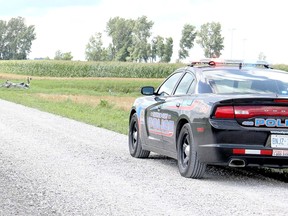 One man has died after a mishap while riding an enduro motorcycle along Bear Line Road, north of Mud Creek Line, south of Wallaceburg, Ontario on Sunday, July 28, 2013. (VICKI GOUGH, The Daily News)