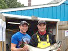 The 30th Chantry Chinook Classic Salmon derby is currently led by Port Dover’s Mark Addison (right), who was leading as of Monday with his 21.48 lb. salmon. (SUBMITTED)