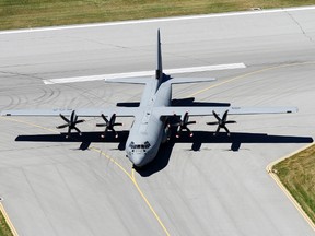 One of the 17 C-130J Hercules is seen taxing in on the runway at 8 Wing/CFB Trenton, Ont. Friday, July 26, 2013. JEROME LESSARD/The Intelligencer/QMI Agency