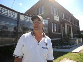 Harmony for Youth board member Rick Labelle stands in front of the agency's Campbell Street building Wednesday July 24, 2013 in Sarnia, Ont. The charity that offers music and anti-bullying programming for youngsters is planning to reopen its doors Sept. 9. TYLER KULA/ THE OBSERVER/ QMI AGENCY