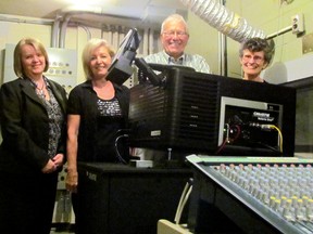 Bonnie Lavergne, Fran Catenacci, Bob Dell and Susie Beynon show off cineSarnia's new Christie DCP digital projector. Group members say the new digital projection will provide enhanced picture quality, making film showings an even better experience for the group's more than 500 subscribers and rush ticket buyers. LIZ BERNIER / THE OBSERVER / QMI AGENCY