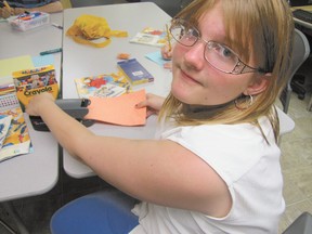 Natasha McMichael, 12, draws a for a project in a session on Japanese culture in the Mayerthorpe Public Library Summer Reading Program on Monday, July 22. The program is led by Darsi Hall, the library’s C.A.P. (Community Access Program) youth intern.