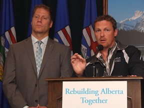 KEVIN RUSHWORTH HIGH RIVER TIMES/QMI AGENCY. Doug Griffiths, Minister of Municipal Affairs, rolls out the province of Alberta's new flood recovery policies along with Rick Fraser, Minister of High River's Recovery.