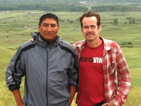 Sean Hogan, left, a singer-songwriter originally from Sarnia, met with Leonard Bearshirt at the Siksika First Nation in Alberta after a television interview Bearshirt gave inspired Hogan to write a song to benefit Alberta flood relief efforts. Love Leads The Way, Come Hell Or High Water features vocals by Hogan and several other Canadian country artists. It's expected to be available for downloading in early August. Sarnia, Ont., July 26, 2013 (Submitted photo)