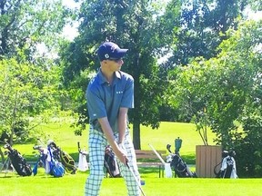 Portage la Prairie's Brayden Twist sets up to hit a drive at the Maple Leaf Junior Golf Tour even in Teulon July 26, which he won. (Submitted photo).