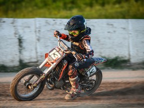 Boyd Deadman, 8, of Woodstock is set to race in his hometown Saturday at the Woodstock fairgrounds. Flat track motorcycle races haven't happened at the fairgrounds since the mid-1990s. 
(Karolina Pelc photo)