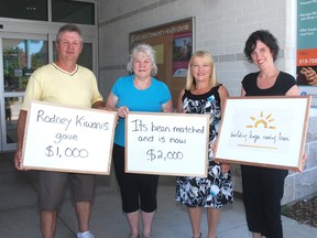 John Johnston, president of the Kiwanis Club of Rodney, presents a cheque for $1,000 to Carol Watson and Diane Brown of the Building Hope, Saving Lives committee which is raising money to build a new emergency shelter for women in St. Thomas which will serve all of Elgin county as well. On the right, is Liz Brown, executive director of Violence Against Women Services Elgin County which operates the shelter.