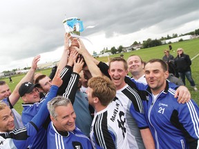 Manluk FC hoists the Battle River Cup and celebrates winning the regular season win their 2-1 victory over Diablos FC July 28.