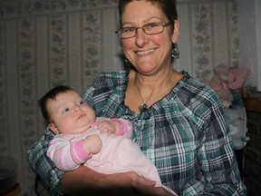 Monique DeCoste is pictured with one of her grandchildren. The Trenton resident said she is recovering well following a fatal car crash in northern New Brunswick more than two months ago.