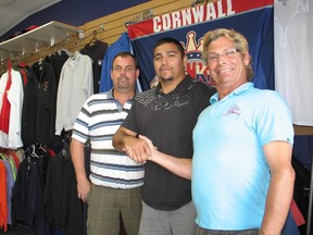 The Cornwall River Kings have welcomed Akwesasne's Casey Swamp (centre) to the Ligue Nord-Americaine de Hockey squad. The River Kings owner is Bernie Villeneuve (right) and Rick Lapierre (left) is business and hockey operations manager. 
Todd Hambleton staff photo