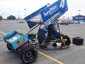 Rain kept the World of Outlaws Sprint Cars Series away from the Cornwall Motor Speedway last Sunday night. Some drivers, including Cody Darrah, of Huntersville, North Carolina, settled for working on their sprint cars at the Wal-Mart parking lot in Cornwall. 
Robert Lefebvre photo