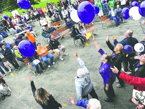 Cancer survivors release balloons following the survivor's walk Saturday night during the Mower County Relay for Life 2013 in Austin, Minnesota. One of the balloons landed in Paris, Ontario about 22 hours later and 1,000 km away. ERIC JOHNSON/Austin Daily Herald