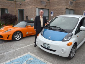 Presqu'ile resident and Owen Sound lawyer Allen Wilford stands with his Mitsubishi i-MiEV electric car at Inn on the Bay in Owen Sound on Wednesday.