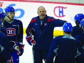 Randy Ladouceur is pictured during his stint as an assistant coach with the Montreal Canadiens during the 2011-2012 season. Ladouceur has a new coaching job, having signed on this week as an assistant coach with the AHL's Lake Erie Monsters. (QMI AGENCY FILE PHOTO)