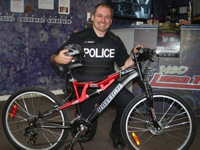 Timmins Police Const. Rick Lemieux was at Neo Laser Tag Wednesday to kick off the launch of the fifth-annual Helmets On campaign. One boy, one girl and one adult will each win a new bike this summer as a reward for wearing a helmet while cycling. The campaign kicks off Aug. 1 and runs until Sept. 6.