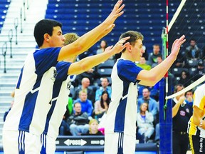 Portage la Prairie's Adam Thompson, right, a member of the Windsor Lancers volleyball team, awaits a serve during a game last season. Thompson will be a part of Team Manitoba at the Canada Summer Games. (Submitted photo)