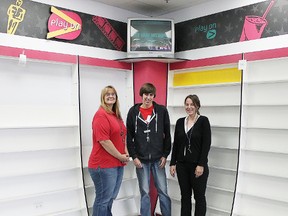 Long time employees of Bianco’s Movie Gallery in Espanola, Traci Sauder, Randy VanAllen and Christina Martin stand amongst the empty shelves as the store prepared to close last week. Photo by Dawn Lalonde/Mid-North Monitor/QMI Agency