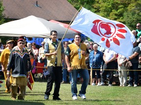 Cape Croker chief Scott Lee, right, takes part in a special dance in memory of former chief Ralph Akiwenzie at the annual Cape Croker Pow wow on Saturday August 18, 2012. Lee was elected head councillor in the Chippewas of Nawash Unceded First Nation elections on Friday. Arlene F. Chegahno is the new chief.