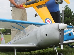 Kai Sorensen, left, and Al Harse with the Bluewater R/C Flyers of Sarnia club, stand with a pair of De Havilland Chipmunk scale model airplanes recently. The local group is hosting its annual Scale Model Rally in Sarnia-Lambton Saturday. TYLER KULA/ THE OBSERVER/ QMI AGENCY