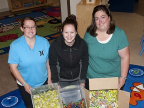 TAYLOR WEAVER HIGH RIVER TIMES/QMI AGENCY
Christine Scherer-Smith, Nikki Gass and Michelle Kessle from The Parent Link Centre are eagerly awaiting the arriving of school supplies and backpacks so they can help get students ready for the upcoming school year.