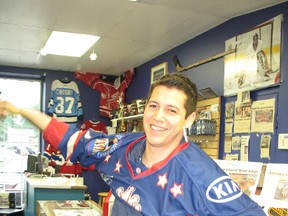 Akwesasne's Ian Boots tried on a River Kings jersey on Thursday, after being signed by the Ligue Nord-Americaine de Hockey club. Boots played in three different minor pro leagues last season.
TODD HAMBLETON staff photo