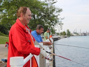 Bob Coates and Glenn Yates spent a relaxing morning along Sarnia's waterfront this week. Environment Canada is predicting a slightly cooler than normal August in Sarnia after the area went through a soggy July this year. TARA JEFFREY/THE OBSERVER/QMI AGENCY