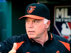 Baltimore Orioles manager Buck Showalter (26) watches batting practice at Kauffman Stadium on July 24, 2013 in Kansas City, Missouri.  (Jamie Squire/Getty Images/AFP)