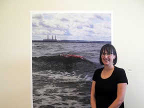 Tanya Harnett held a reception for her Scarred/Sacred Water exhibit at the Multicultural Heritage Centre on July 27. Depicted here: Wabamun clean-up site, Paul First Nation. - April Hudson, Reporter/Examiner