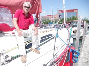 Mike Spence aboard his yacht Voyager at the Bondar Transient Marina on Thursday.
