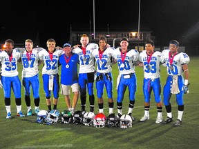 Sherwood Park coach Scott Smith poses with his receiving corps at the recent Football Canada Cup. Photo supplied