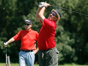 The Regimbal Media Challenge took place at Falcon Ridge Golf Club in Ottawa Friday Aug 3, 2012. Don Brennan tees off during Friday's media challenge. (QMI AGENCY/Tony Caldwell/Ottawa Sun)