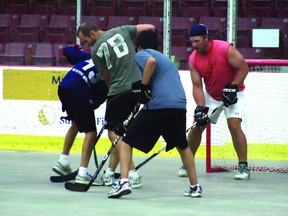 Players from Greener and High Havarti scramble infront of Greener’s net trying to find the ball during one of the Kenora Ball Hockey Club games at the Kenora Recreation Centre on Monday, July 29.