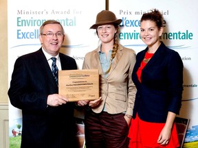 Ontario's Minister of the Environment Jim Bradley presented the 2012 Minister’s Award for Environmental Excellence to Pine River Watershed Initiative Network's project coodinator Adrienne Mason, and assistant project coordinator Elizabeth Simpson, as one of six awards during the presentation in Toronto on July 29, 2013. (SUBMITTED)