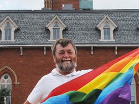 Eric Hargreaves, a Pride in the Park committee member, in front of Belleville city hall.