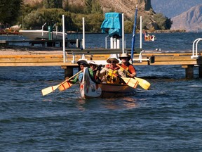 Members of the Voyageur Brigade Society prepare to land in Summerland, B.C. during the Okanagan tour last summer. This year, the Rideau Canal Brigade will be taking to the waters of the Rideau Canal, starting Aug. 5.
