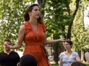 The community began immediately to show support for the lesbian couple who received hate mail last month, in events such as a rally in Skeleton Park organized by Claire Grady-Smith, shown here addressing the crowd that gathered the day the contents of the letters appeared in the newspaper.