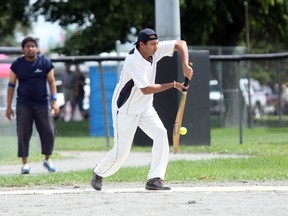 Jacob George of the North Bay Multicultural Cricket Club takes a cut Saturday during a game against the Sault Ste. Marie Cricket Club. The team is hosting its first-ever Northern Ontario Cricket Tournament this weekend. JORDAN ERCIT/The Nugget