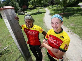 Cyclists Adrienne Barnette, left, and Claire Huller, educators from North Carolina, were at the Emancipation Festival at Harrison Park on Saturday after retracing by bicycle part of the Underground Railroad route from Cincinnati, Ohio, to Owen Sound. (James Masters The Sun Times)