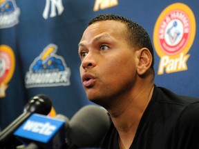Alex Rodriguez answers questions at a news conference after playing for the Trenton Thunder in Trenton, N.J, Saturday, Aug. 3, 2013. (Scott Anderson/Reuters)