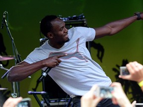Usain Bolt attends a party in central Moscow on August 4, 2013 ahead of the world athletics championships August 10-18. (AFP PHOTO/KIRILL KUDRYAVTSEV)